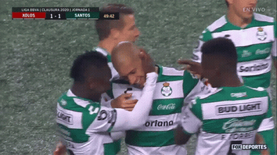 A Group Of Soccer Players Wearing Green And White Jerseys Sponsored By Bud Light GIF