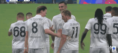 A Group Of Soccer Players Wearing Jerseys With The Numbers 68 8 71 And 99 5 GIF