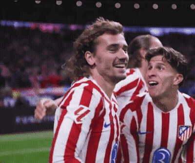 A Group Of Soccer Players Wearing Red And White Striped Jerseys With The Number 3 On Them GIF