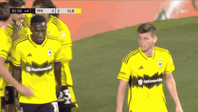 A Group Of Soccer Players Wearing Yellow Jerseys That Say Nationalwide On Them GIF