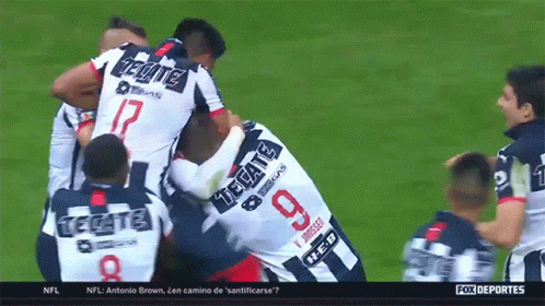 A Group Of Soccer Players With One Wearing A Number 9 Jersey GIF