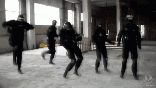 A Group Of Soldiers Are Dancing In A Room With The Website Vk.com/free4k.ru On The Bottom GIF