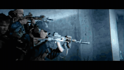 A Group Of Soldiers Are Holding Guns In A Dark Room And One Of Them Is Wearing A Hat That Says Army GIF