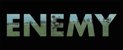 A Group Of Soldiers Are Running In A Field With The Word Nem Behind Them . GIF