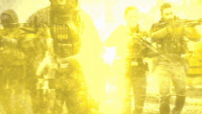 A Group Of Soldiers Are Standing In A Line And One Of Them Has The Number 1776 On His Shirt GIF