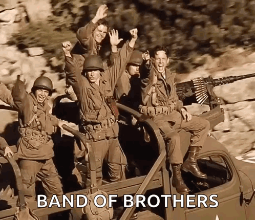 A Group Of Soldiers Riding In The Back Of A Truck With The Words Band Of Brothers Written Below Them GIF