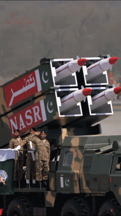 A Group Of Soldiers Stand In Front Of A Military Vehicle With Nasr Written On The Side GIF
