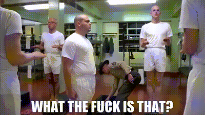 A Group Of Soldiers Standing In A Room With The Words What The Fuck Is That GIF