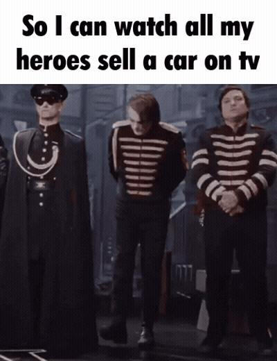 A Group Of Soldiers Standing Next To Each Other With The Caption So I Can Watch All My Heroes Sell A Car On Tv GIF