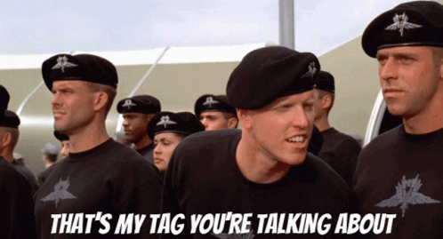 A Group Of Soldiers Standing Next To Each Other With The Caption That 'S My Tag You 'Re Talking About On The Bottom GIF
