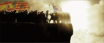 A Group Of Soldiers Standing On Top Of A Hill With Flags GIF