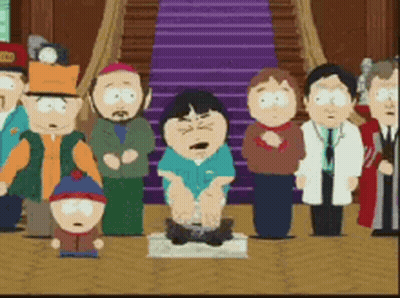 A Group Of South Park Characters Are Standing Around A Man Kneeling Down GIF