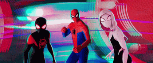 A Group Of Spider-Man Standing Next To Each Other In A Room . GIF