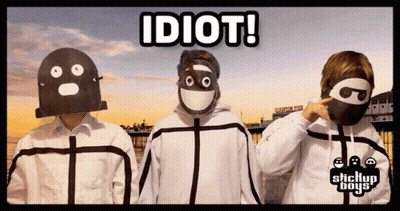 A Group Of Stickup Boys Are Standing Next To Each Other In Front Of A Sign That Says Idiot GIF