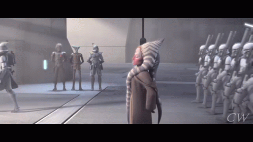 A Group Of Stormtroopers Are Standing In A Room With A Woman Standing In The Middle GIF