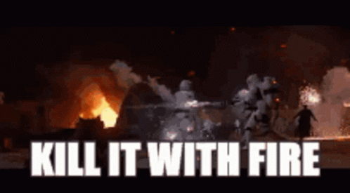 A Group Of Stormtroopers Are Standing In Front Of A Fire With The Words `` Kill It With Fire '' Written In White Letters GIF