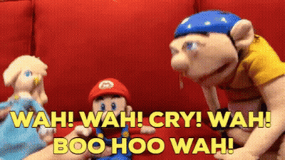 A Group Of Stuffed Animals Are Sitting On A Red Couch And Talking To Each Other . GIF