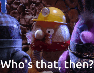A Group Of Stuffed Animals Are Standing Next To Each Other With The Words " Who 'S That Then " Above Them GIF