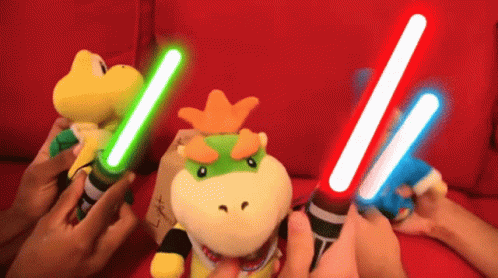 Stuffed Animals Holding Lightsabers GIF