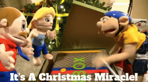 A Group Of Stuffed Animals Playing A Game With The Words It 'S A Christmas Miracle On The Bottom GIF