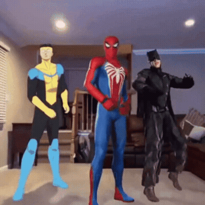 A Group Of Superheroes Are Dancing In A Living Room GIF