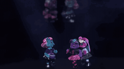 A Group Of Teddy Bears Are Dancing Together In A Dark Room GIF