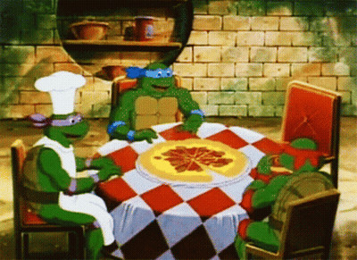 A Group Of Teenage Mutant Ninja Turtles Are Sitting Around A Table Eating Pizza GIF