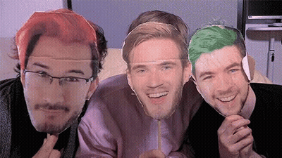A Group Of Three Men Are Posing For A Picture With Their Faces On A Stick . GIF