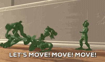 A Group Of Toy Soldiers Are Standing On A Wooden Table And The Words Let 'S Move ! Move ! Move ! GIF