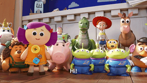 A Group Of Toy Story Characters Are Standing On A Wooden Floor And One Of Them Is Saying Hi GIF