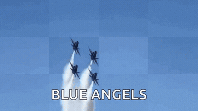 A Group Of Us Navy Fighter Jets Fly In Formation GIF