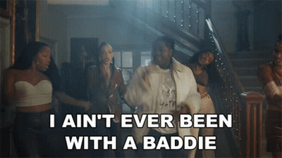 A Group Of Women Are Dancing In A Room With The Words " I Ain T Ever Been With A Baddie " GIF