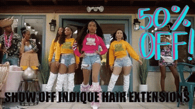 A Group Of Women Are Dancing In Front Of A Building With The Words `` Show Off Indicque Hair Extensions '' On The Bottom GIF