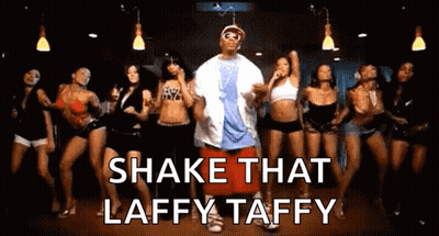 A Group Of Women Are Dancing With The Words Shake That Laffy Taffy In The Background GIF