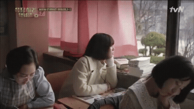 A Group Of Women Are Sitting In A Classroom With A Tvn Logo On The Bottom Right GIF