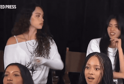 A Group Of Women Are Sitting In Front Of A Screen That Says " Ed Press " GIF