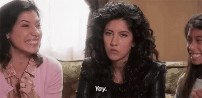 A Group Of Women Are Sitting On A Couch And One Of Them Is Talking . GIF