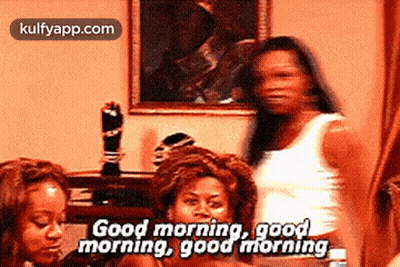 A Group Of Women Are Standing In A Room And One Of Them Is Saying `` Good Morning , Good Morning , Good Morning '' GIF