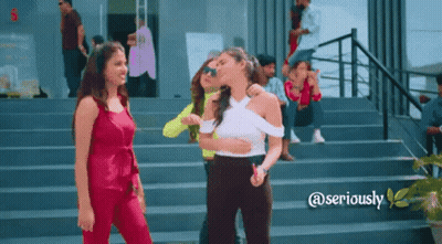 A Group Of Women Are Standing On A Set Of Stairs With The Words @Seriously Below Them GIF
