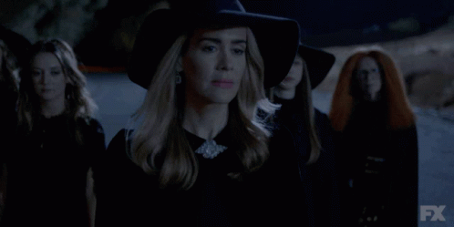 A Group Of Women Are Walking In The Dark With Fx Written On The Bottom Right GIF