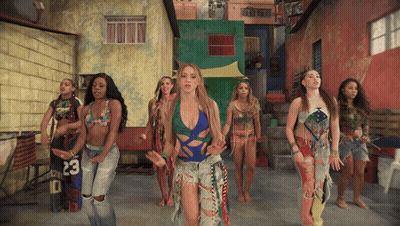 A Group Of Women Dancing With One Wearing A Shirt That Says 23 GIF
