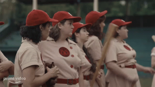 Women In Baseball Uniforms Standing In Line GIF