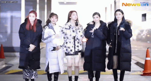 A Group Of Women Standing Next To Each Other With The Newsen Logo On The Bottom Right GIF
