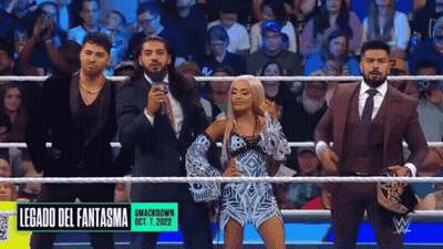 A Group Of Wrestlers Are Standing In A Ring With The Words Legado Del Fantasma On The Bottom GIF