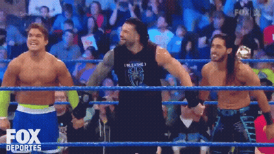 A Group Of Wrestlers Standing In A Ring With The Fox Deportes Logo On The Bottom Right GIF