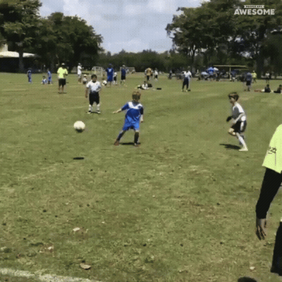 A Group Of Young Boys Are Playing Soccer On A Field With The Words Awesome On The Bottom Right GIF