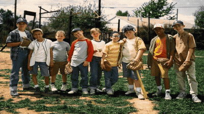 A Group Of Young Boys Are Posing For A Picture While Wearing Ny Hats GIF