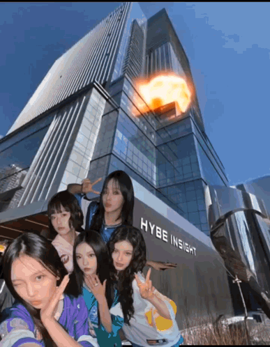 A Group Of Young Girls Pose In Front Of A Building That Says Hybe Insight GIF