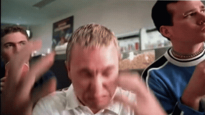 A Group Of Young Men Are Clapping And One Of Them Has A Piercing On His Nose GIF