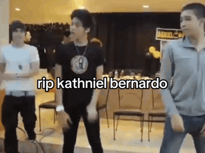 A Group Of Young Men Are Dancing In A Room With The Words `` Rip Kathniel Bernardo '' Written Above Them . GIF